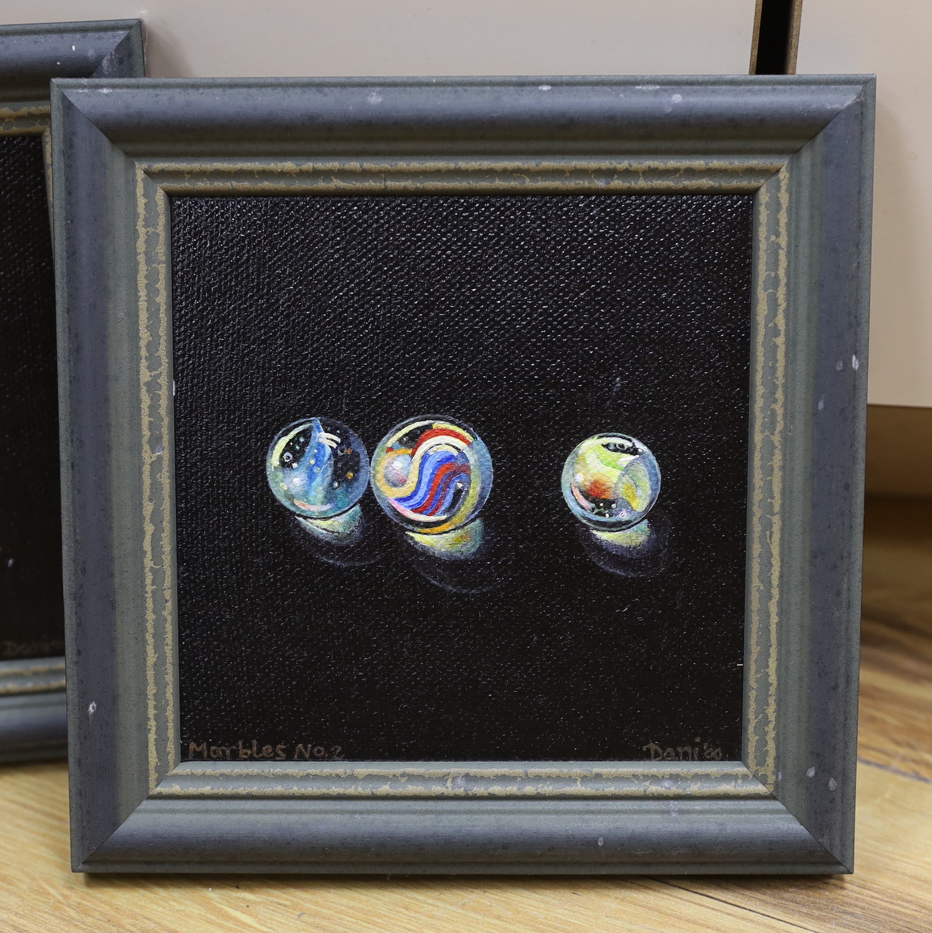 Dani Humberstone (contemporary) three oils on canvas board, Still lifes, 'Big red strawberry', 'Marbles No1' and 'Marbles No2', each signed and dated, largest 12 x 11cm